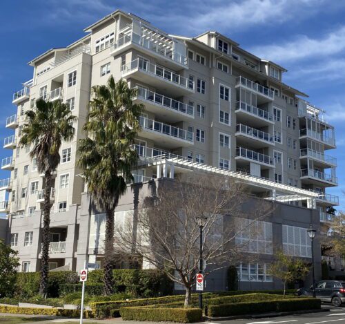 Multi-family building in Sydney with palm trees out the front managed by Divergent Property Solutions